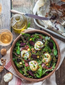 Beet and goat cheese salad in a pot, rustic style