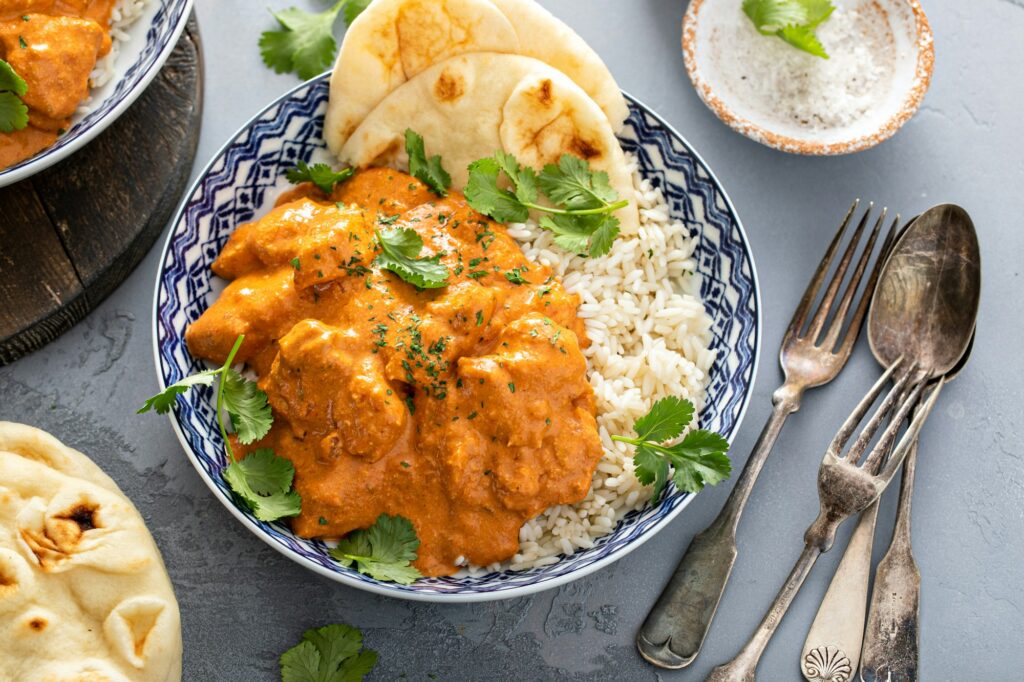 Chicken tikka masala, cooked marinated chicken in spiced curry sauce