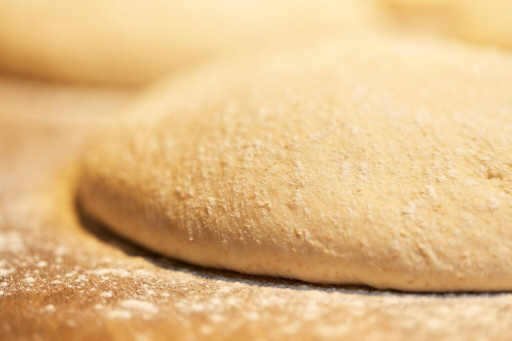 close up of yeast bread dough at bakery