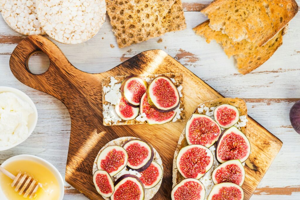 Healthy crackers and toast with figs and ricotta cheese